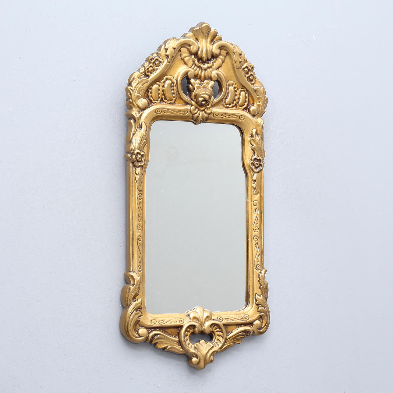 A 20th century bronze frame mirror.