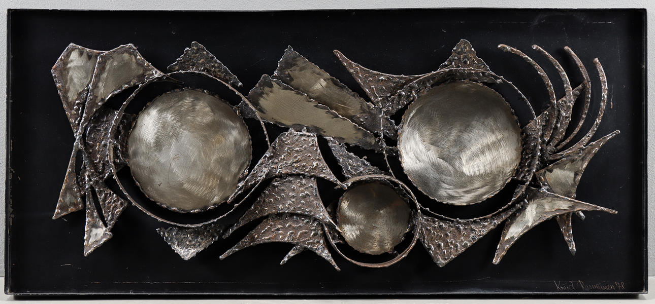 KNUD RASMUSSEN. Wall relief, metal, signed 78.