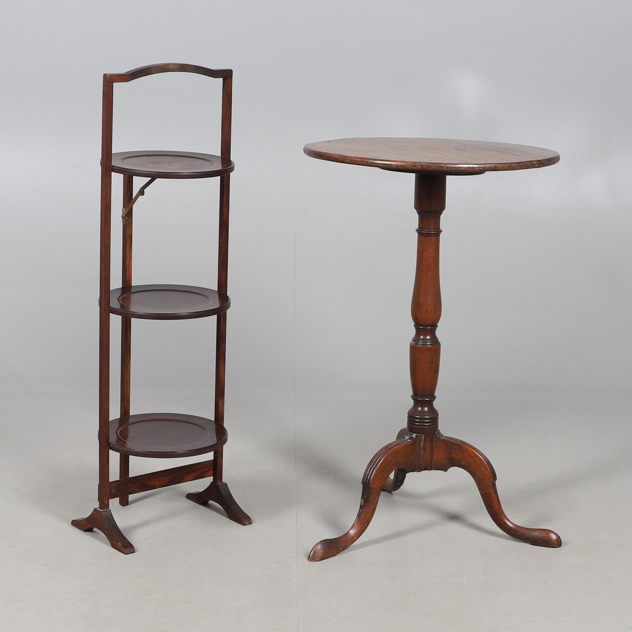 A MAHOGANY TRIPOD TABLE AND A CAKE STAND.