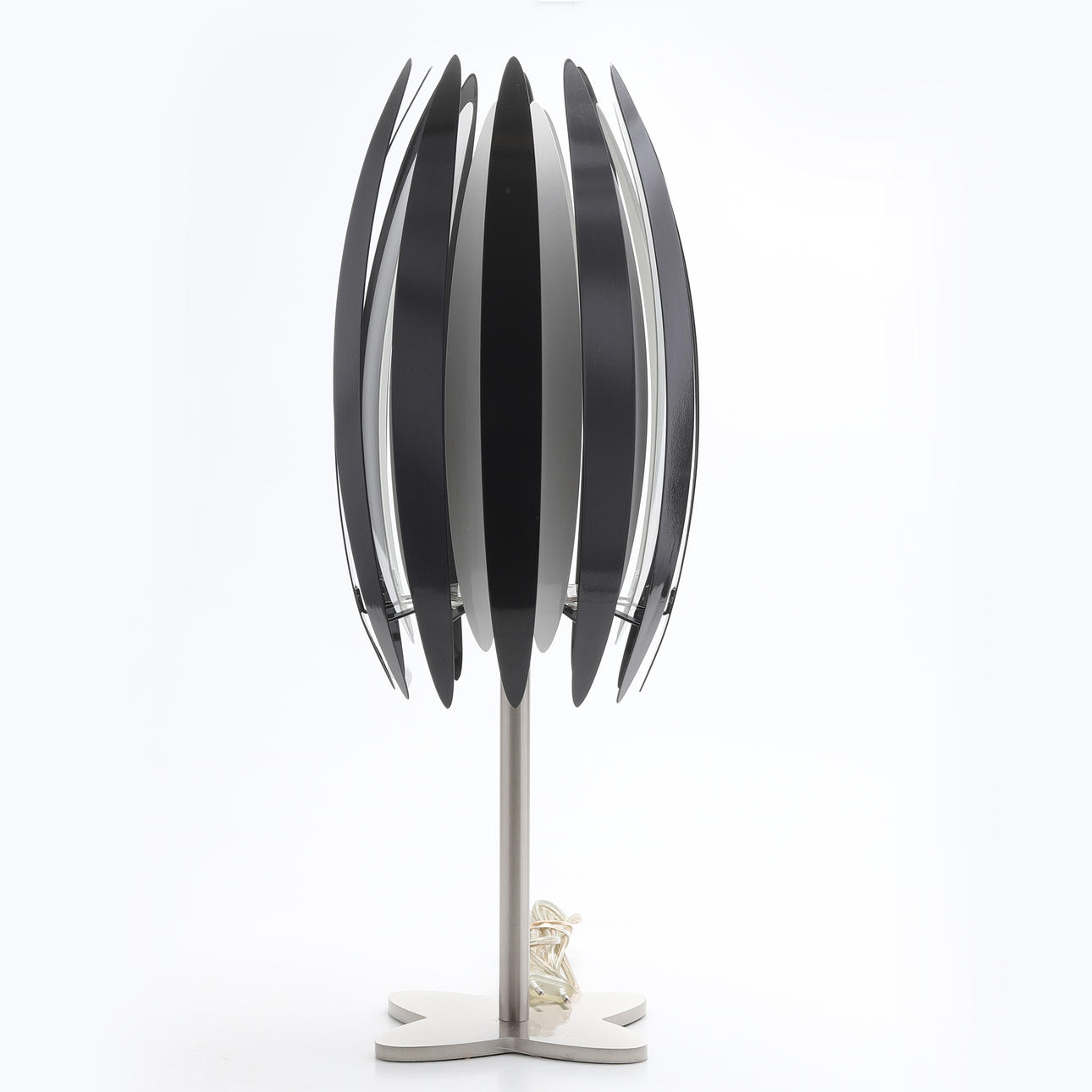 A table lamp, “Jaws”, Frandsen Lighting, Denmark.