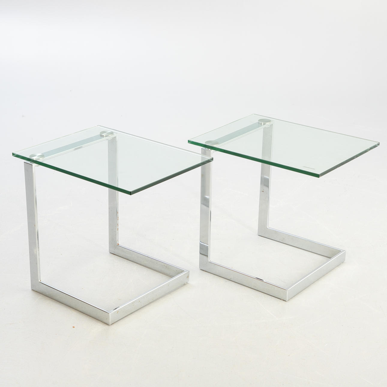 Gebra. pair of glass side tables (2).