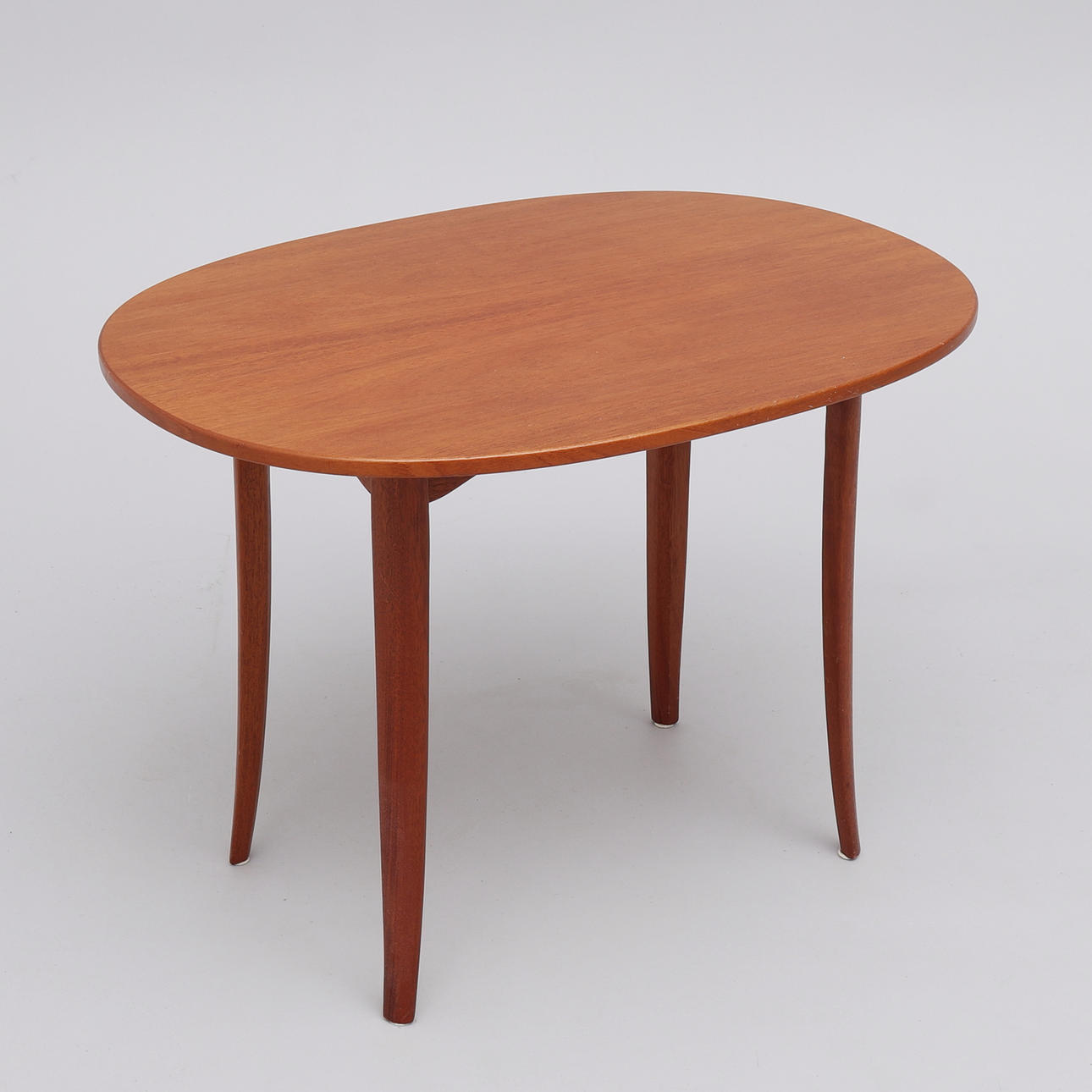 CARL MALMSTEN. SIDE TABLE, “Oval”, mahogany, marked with tray underneath.