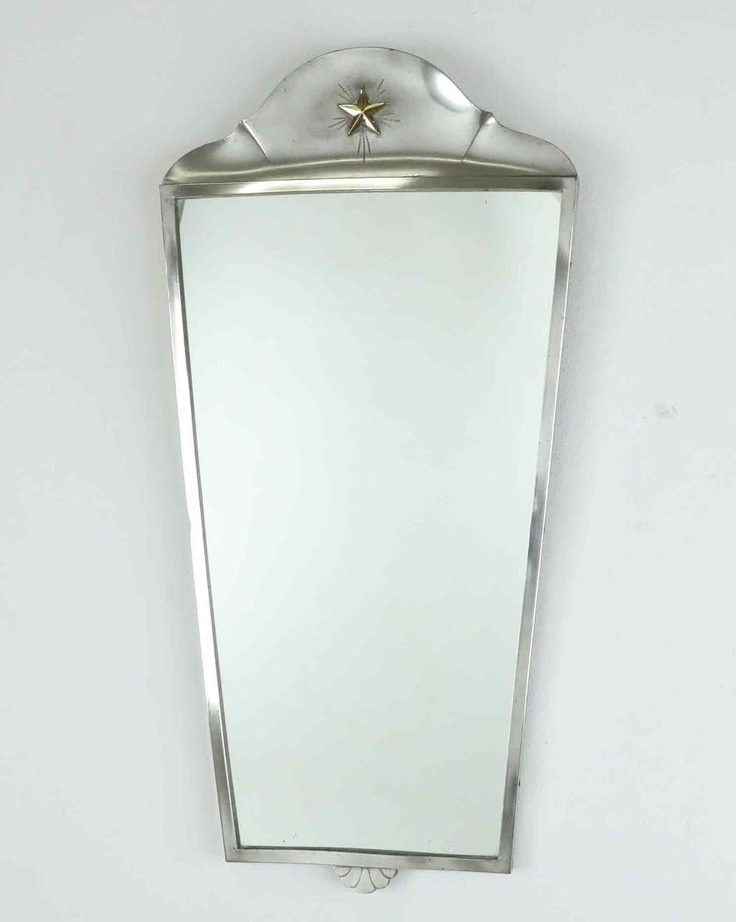 A 1940s Art Decó pewter mirror.