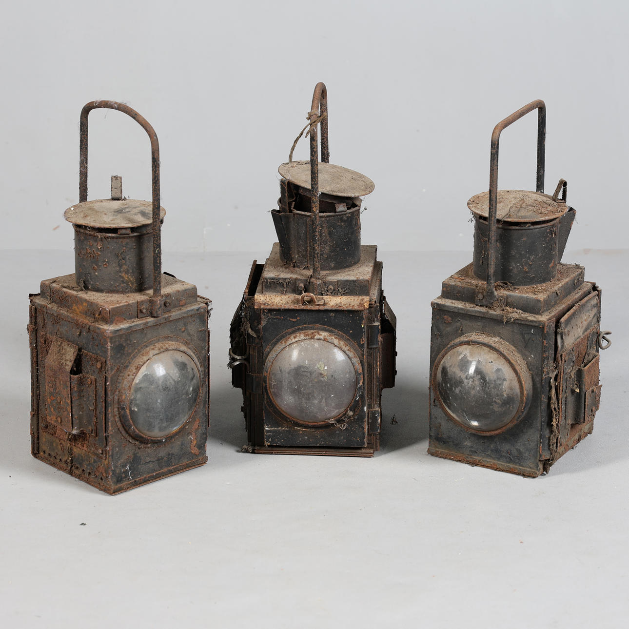 THREE BLACK PAINTED RAILWAY LAMPS (3).