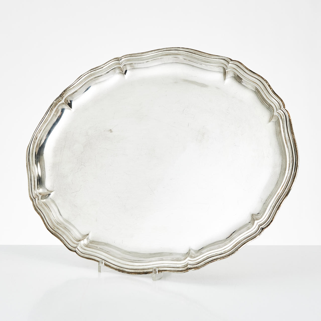 A silver platter, 830S, contoured brim, 20th century.
