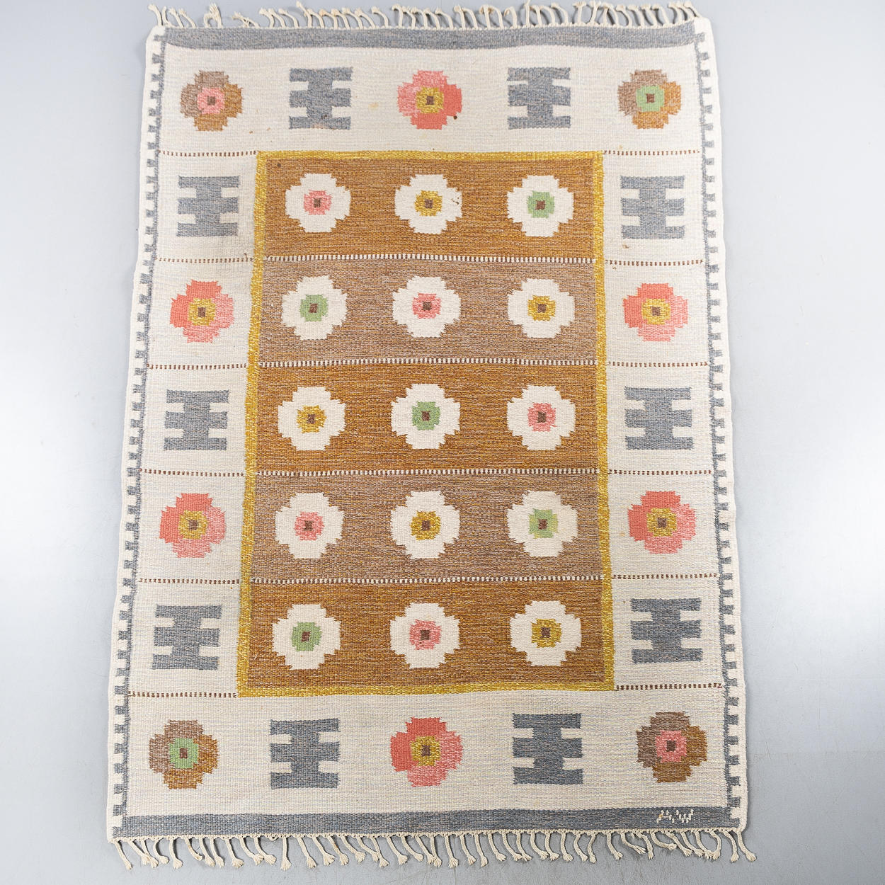 ALICE WALLEBÄCK. Rug, wicker, signed AW.