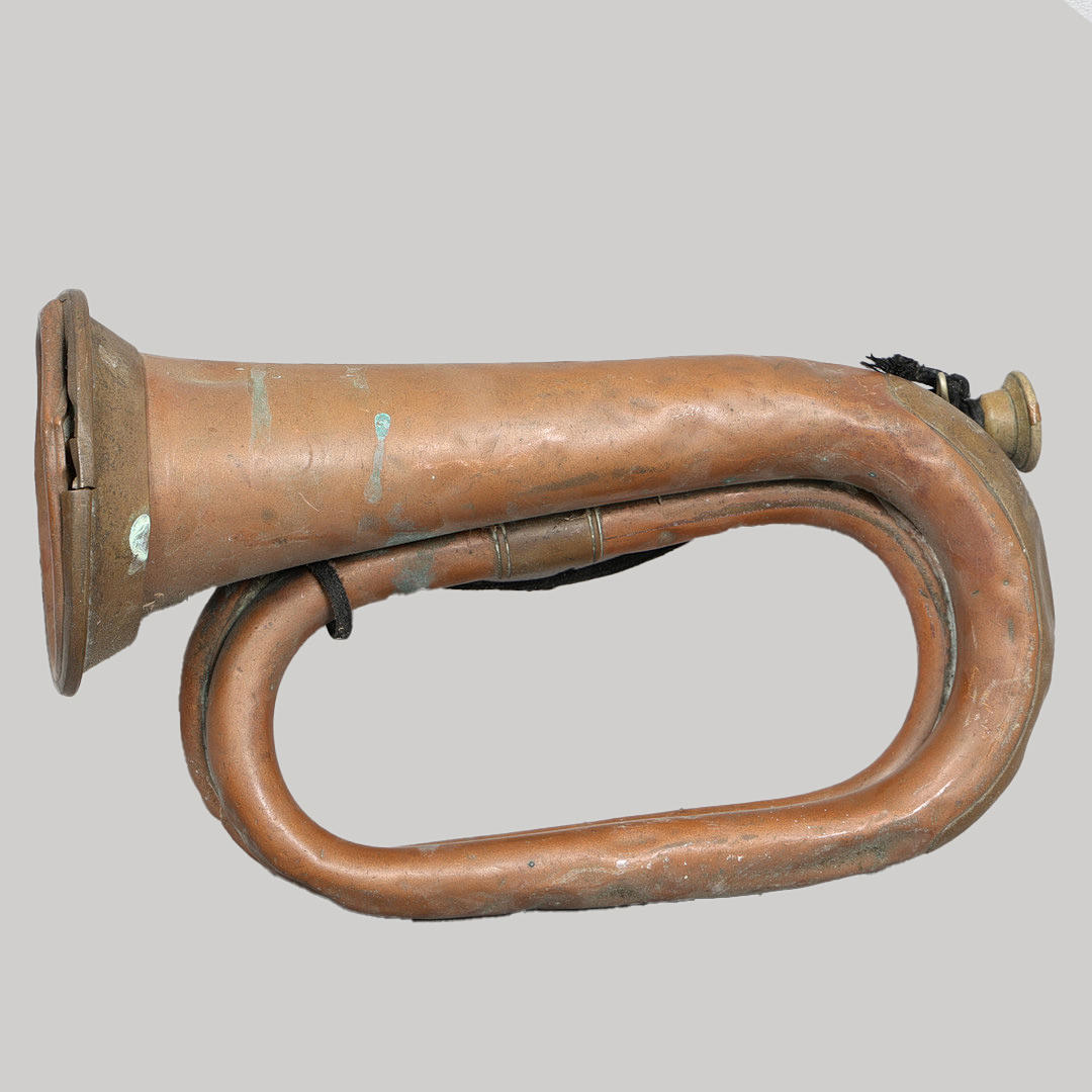 A WW2 PERIOD MILITARY BUGLE BY BESSON & CO.