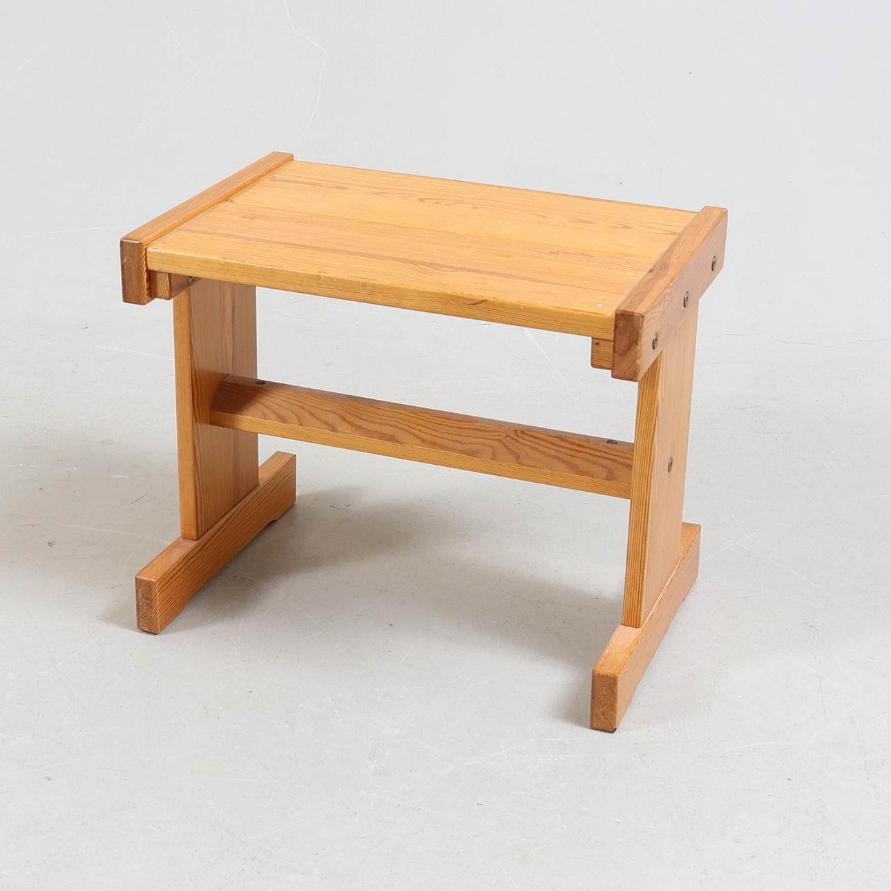 A pine stool, second half of the 20th century.