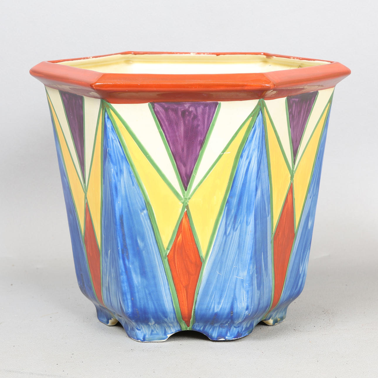 A LARGE CLARICE CLIFF BIZARRE JARDENIERE.