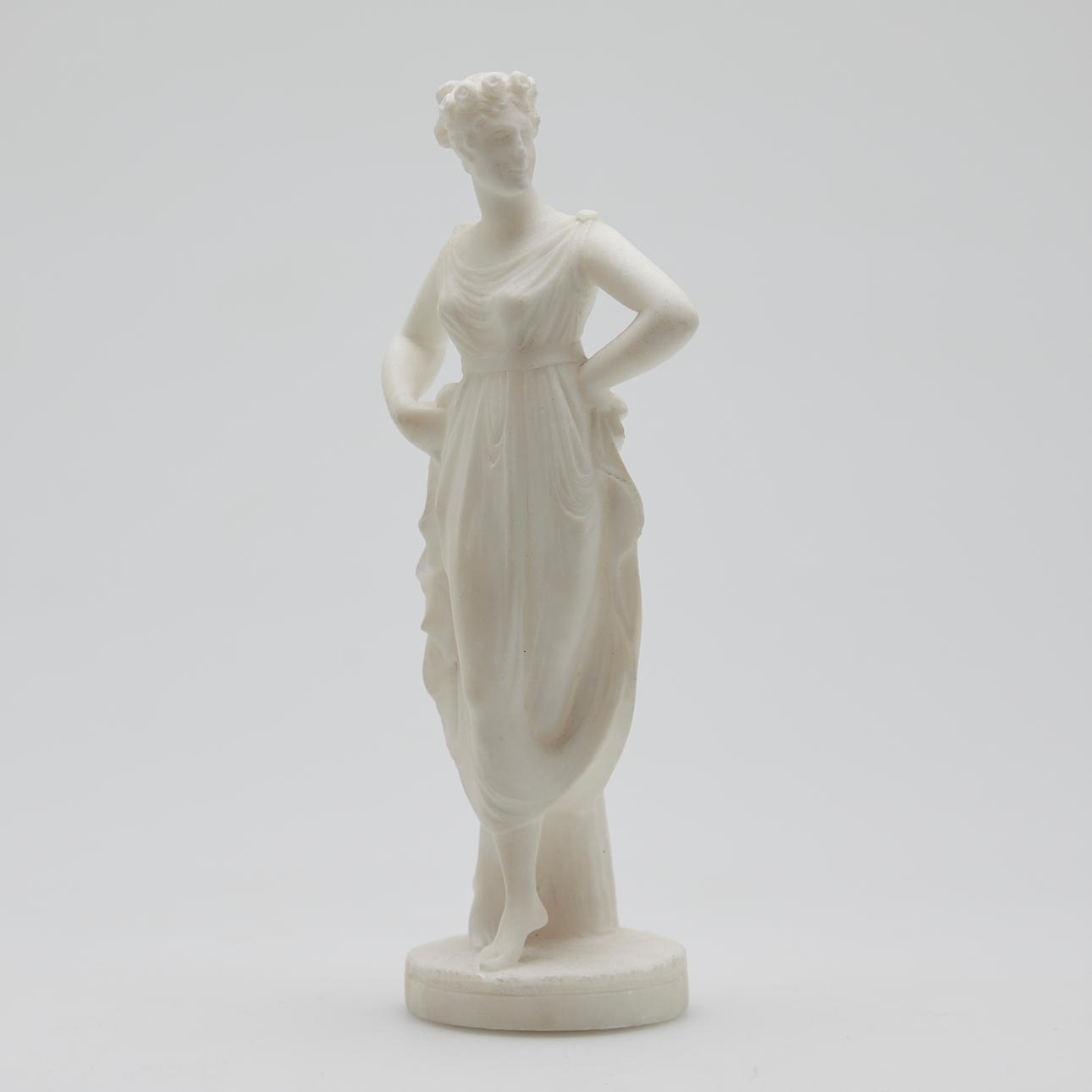 Classicist female figure, miniature sculpture, marble.