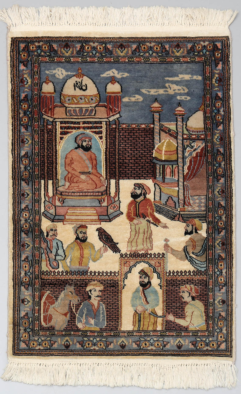 A hand-knotted, wool, oriental prayer rug.