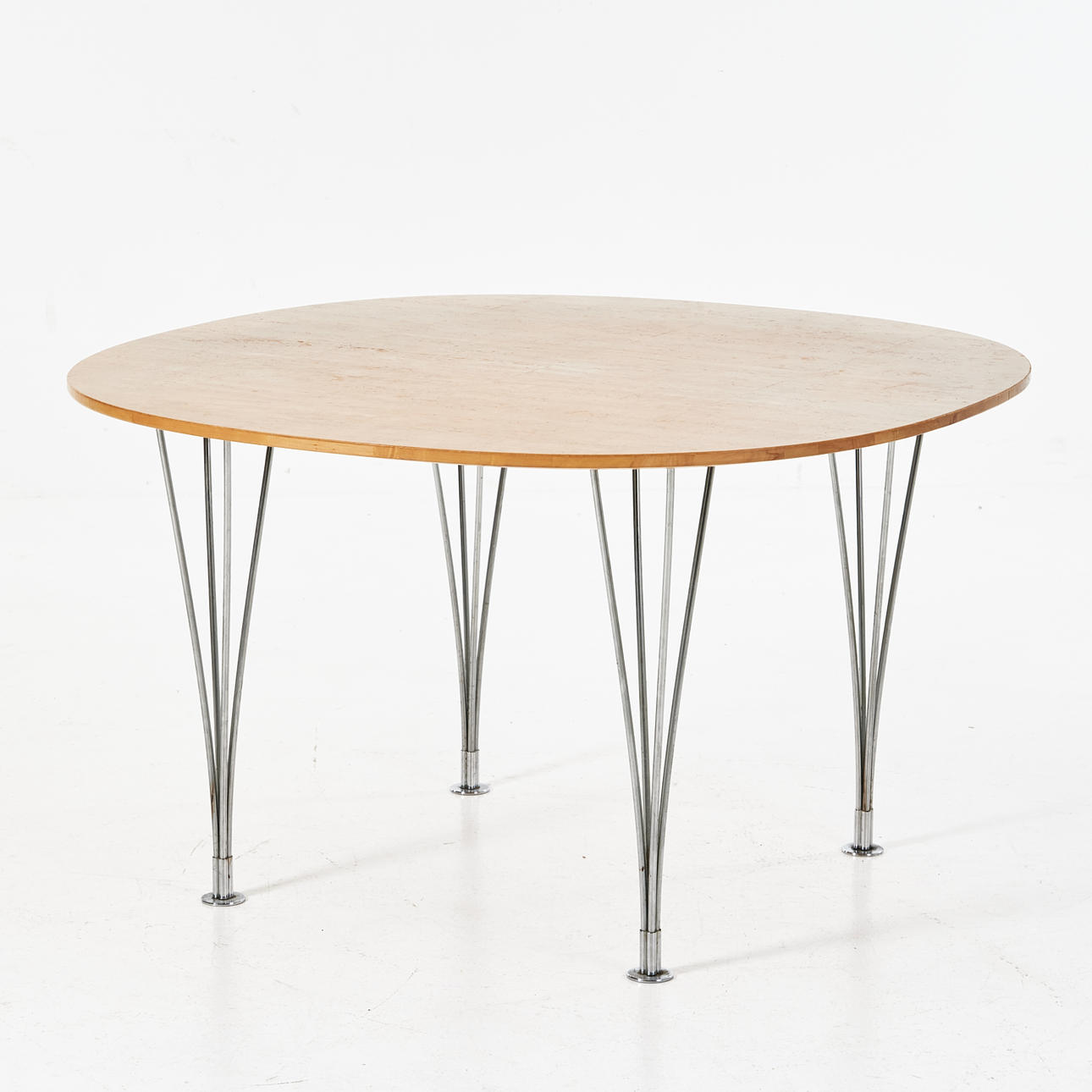 BRUNO MATHSSON / PIET HEIN. “Superelips”, dining table, Bruno Mathsson International, Värnamo, masur birch and chrome legs.