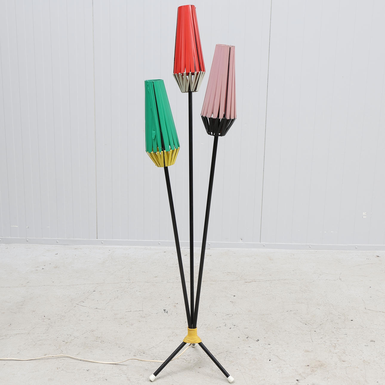 FLOOR LAMP, metal, with plastic strap, 1950s.