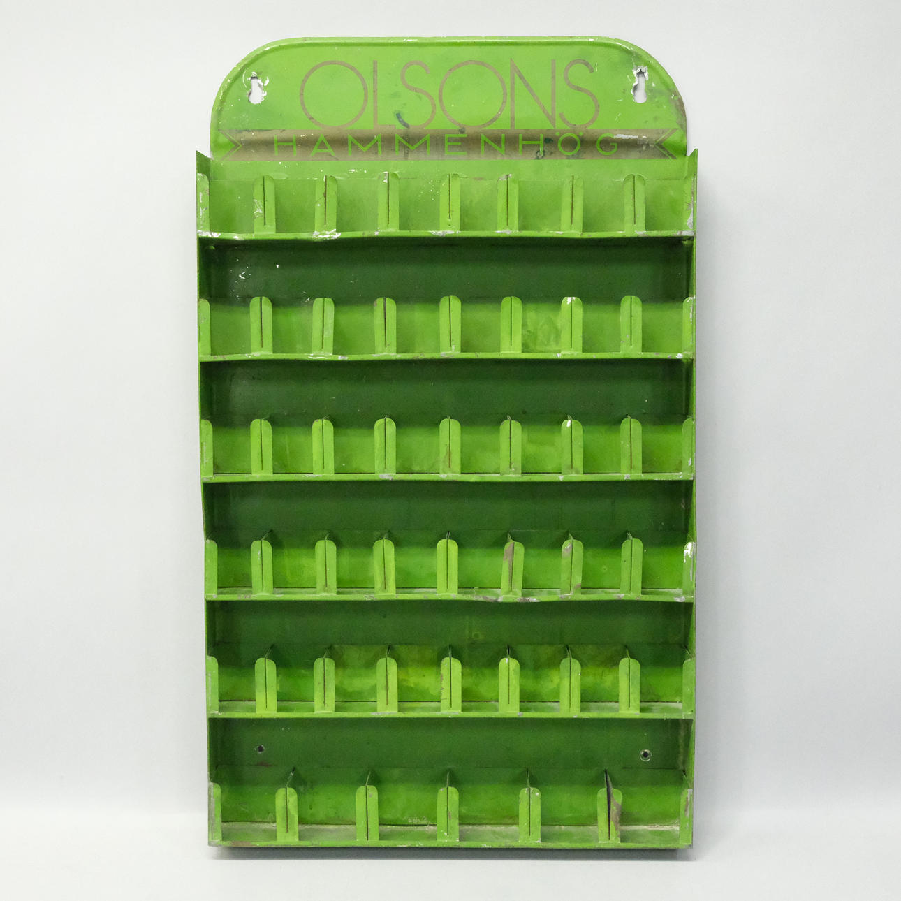 STORE STAND FOR SEED BAGS, “OLSONS HAMMENMOUND”.