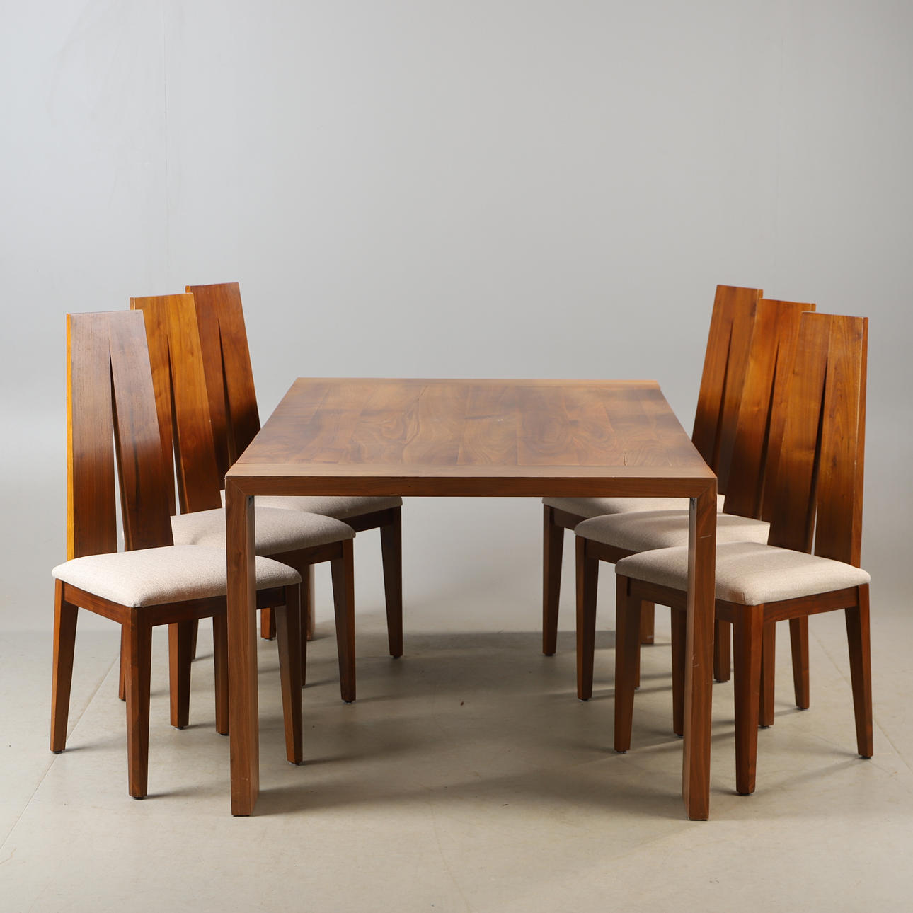 A 7-piece teak Philux dining group, 2000's.