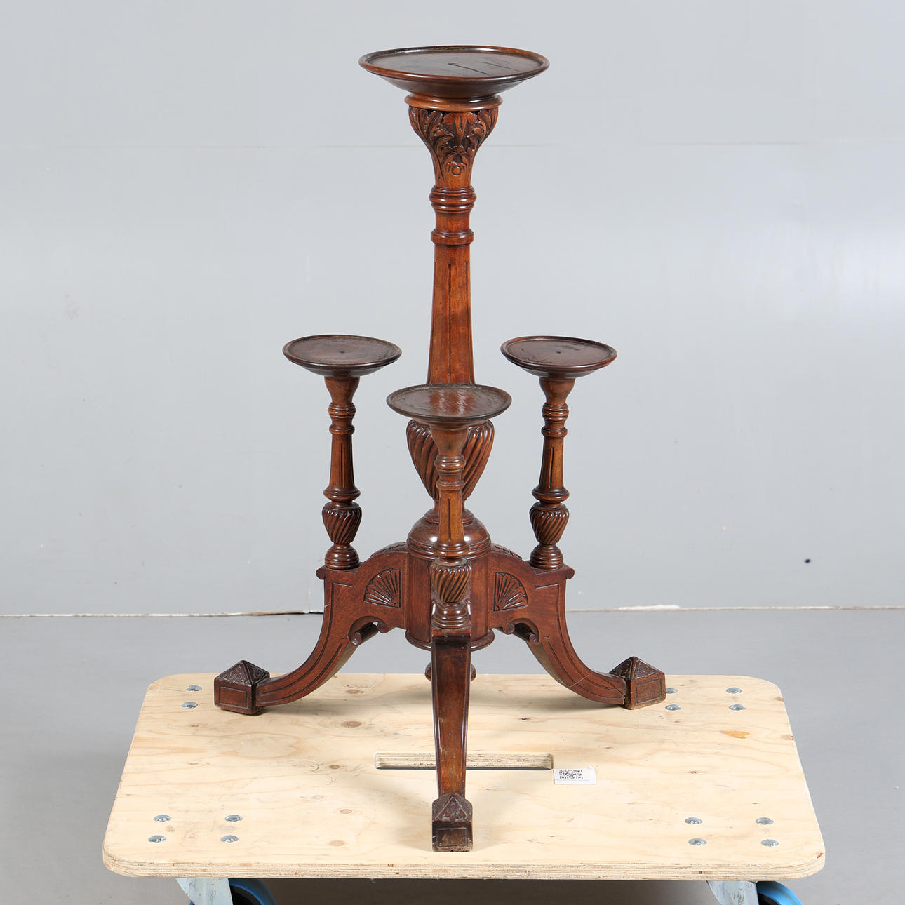 A VICTORIAN WALNUT TORCHERE.