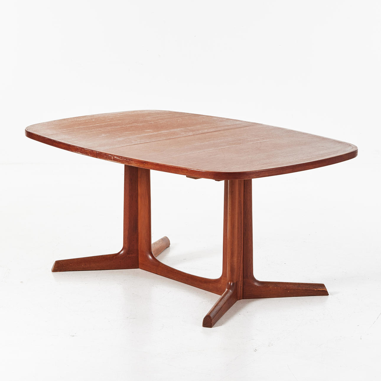 GLOSTRUP. Dining table, teak, Denmark, 1960s/70s, with two inserts, stamped “Made in Denmark” on the underside.