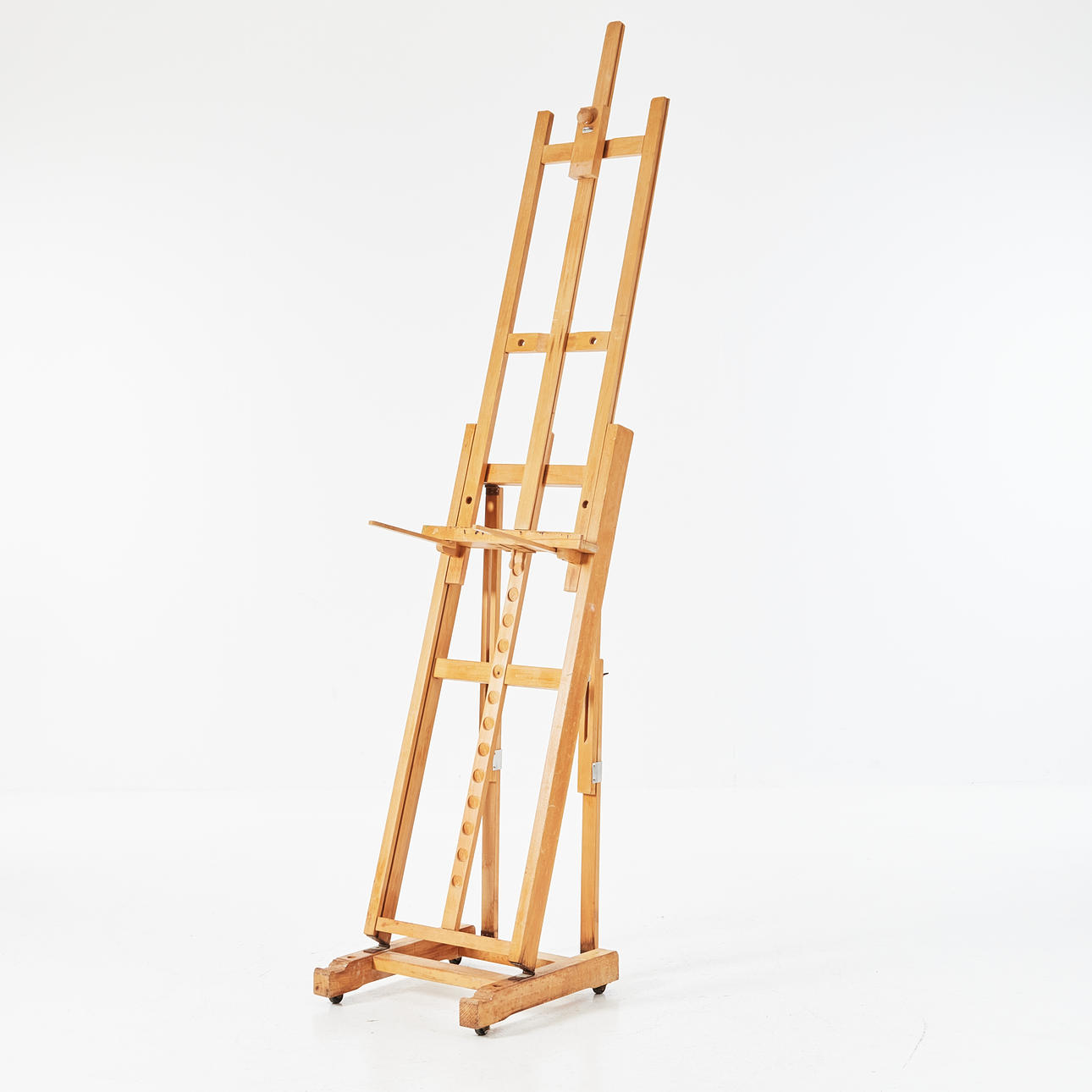 BECKERS LARGE EASEL, contemporary, beech frame, mounted on wheel rails.