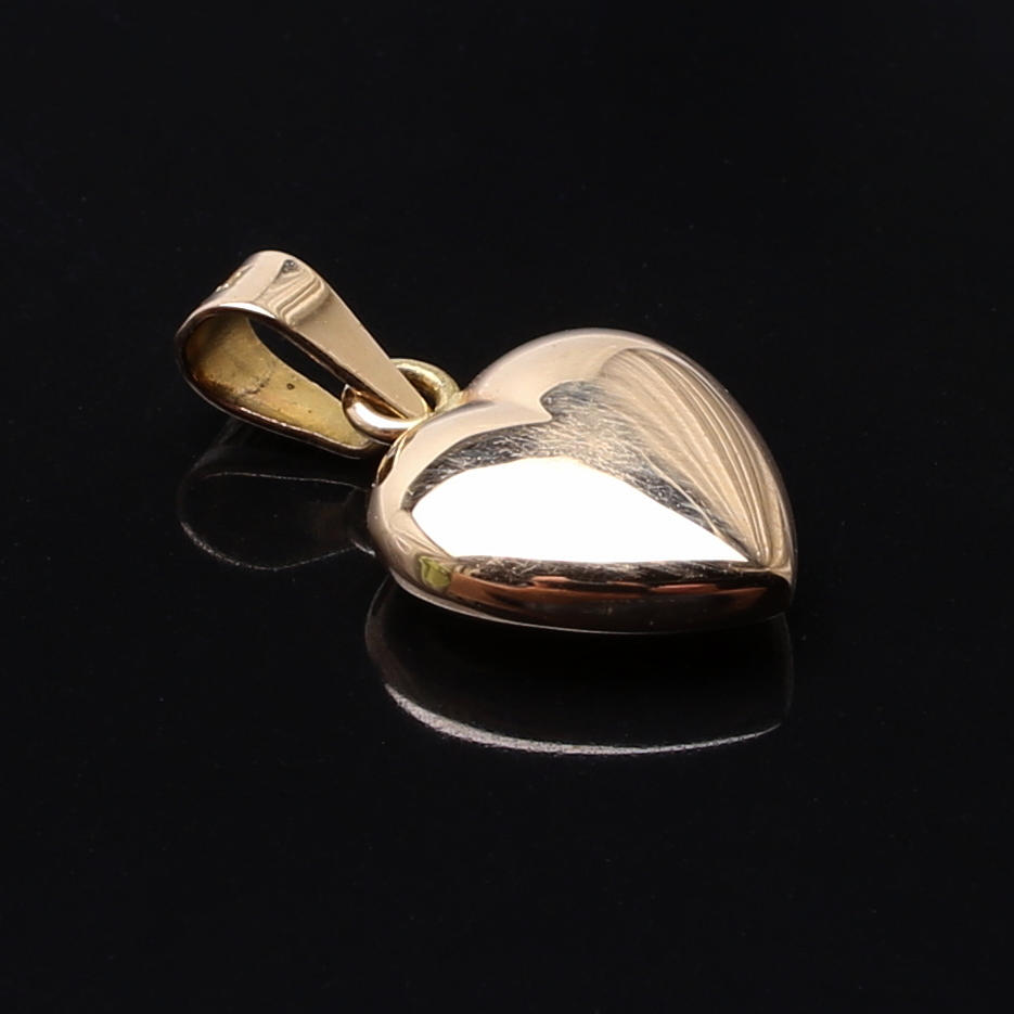 HÄNGE i 18 K massivt gult guld, vikt 2,91 g. NSE Guldvaru AB.