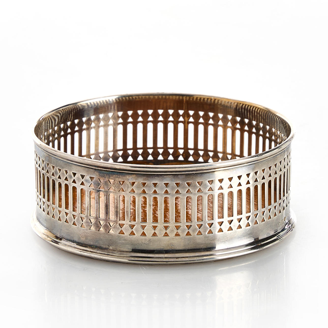 Ein silberner Untersetzer für eine Weinflasche, Nordisk Silverkunst, 1964.