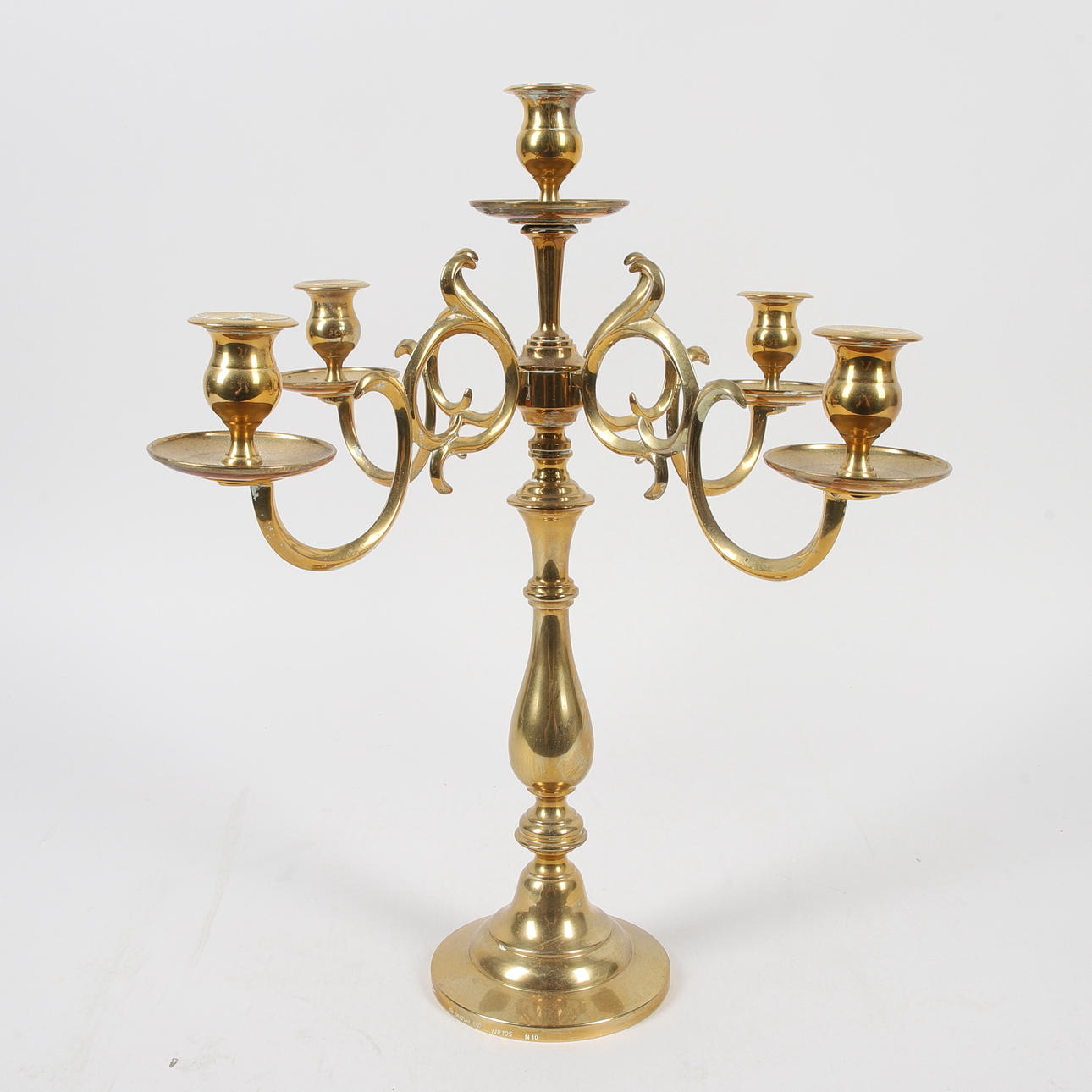 A brass candelabra, Skultuna, no 105.
