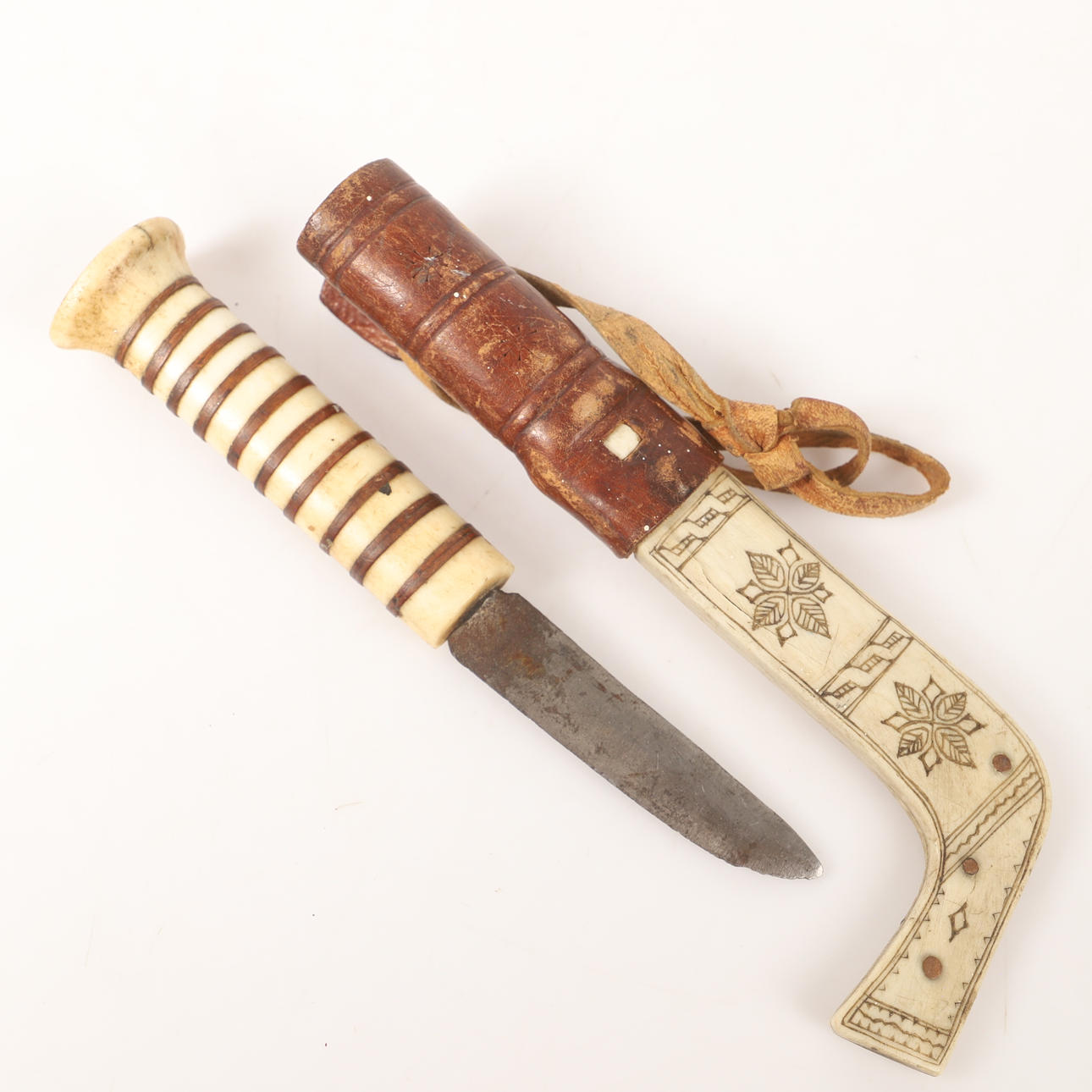 KNIFE, sameared, reindeer horns and skins, signed P Poggats.