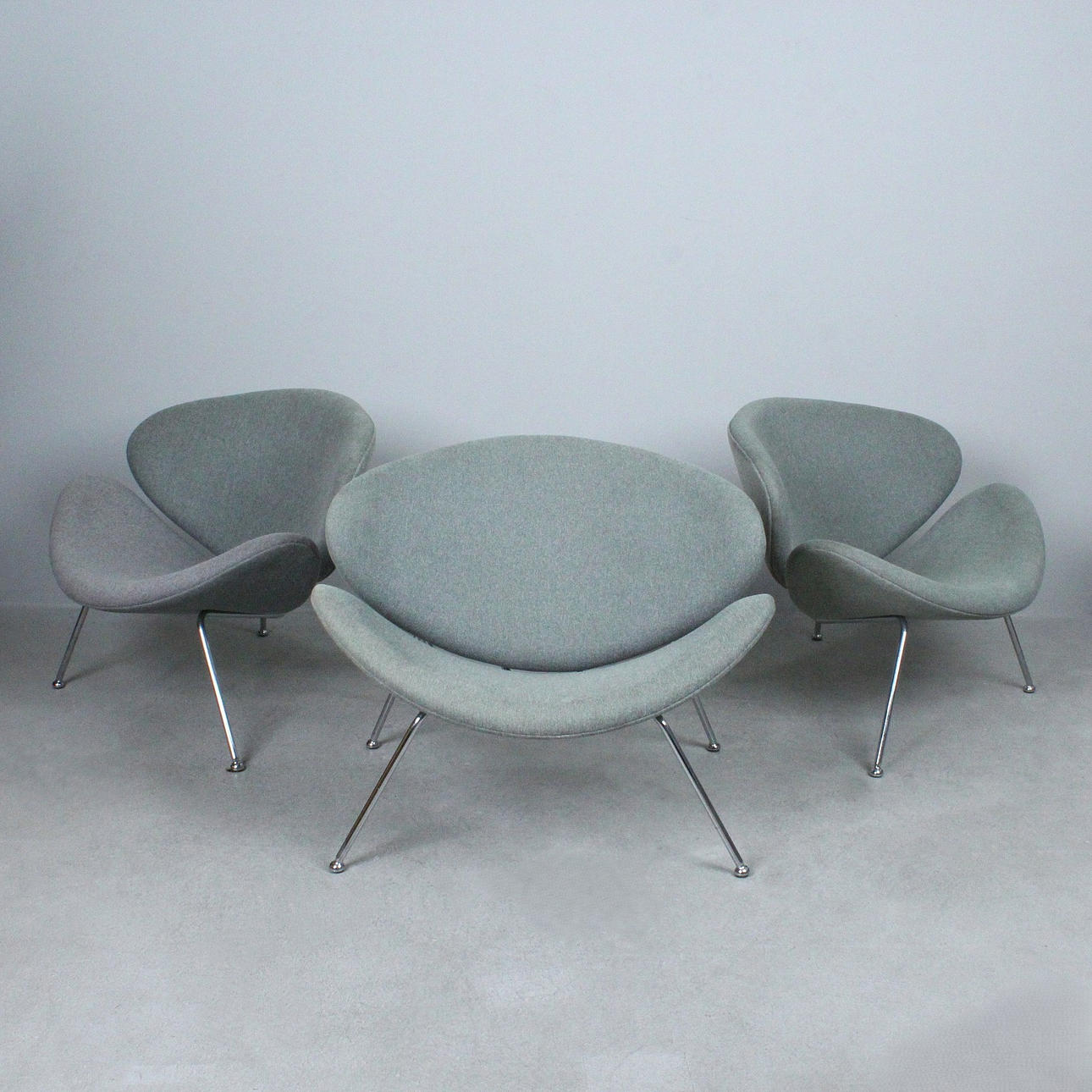 Three lounge chairs from the 1990s.