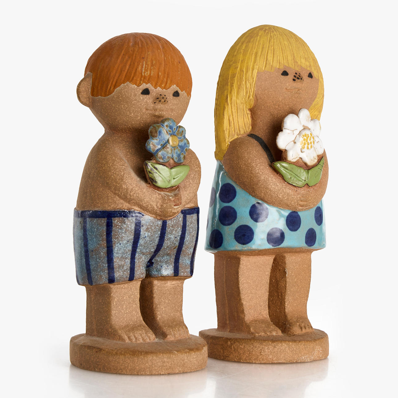 LISA LARSON (1931-2024). Two large Adam and Eve figurines from the