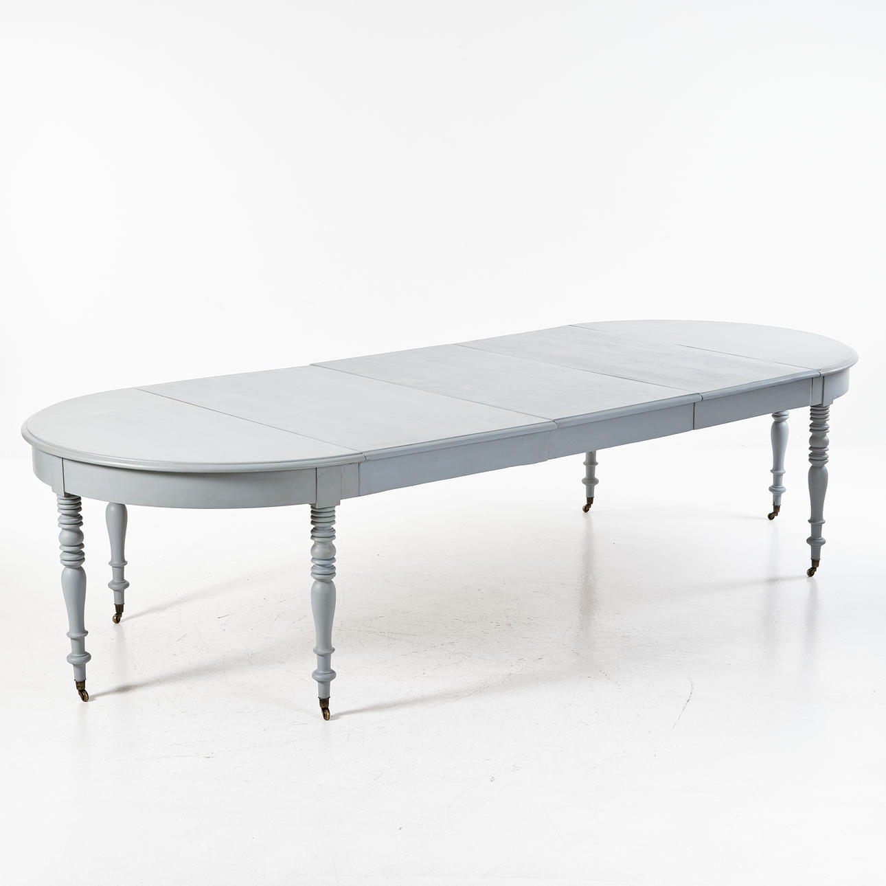 DINING TABLE, turn 1900, turned legs, grey painted, brass tresses, 3 inserts.