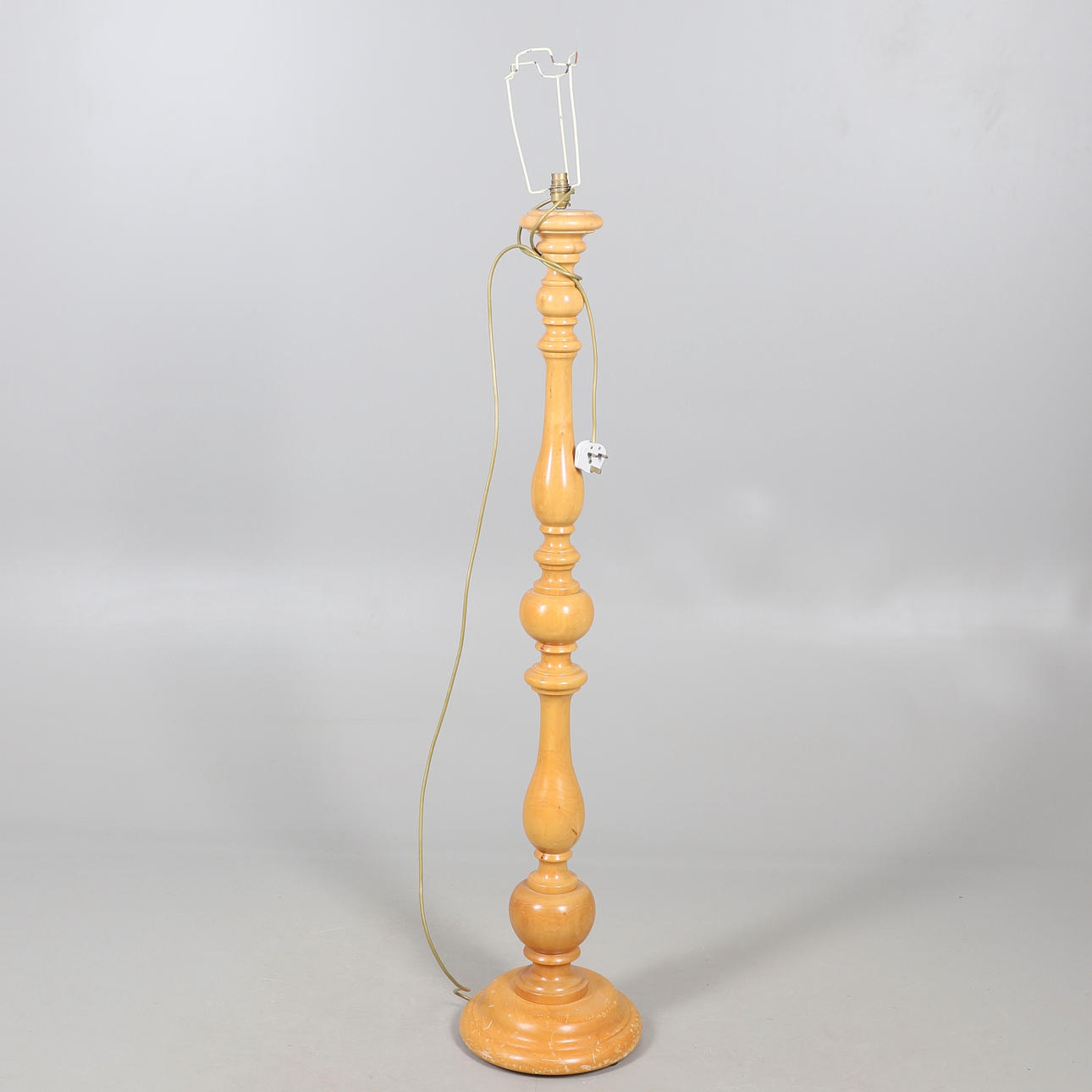 A MODERN PINE STANDARD LAMP.