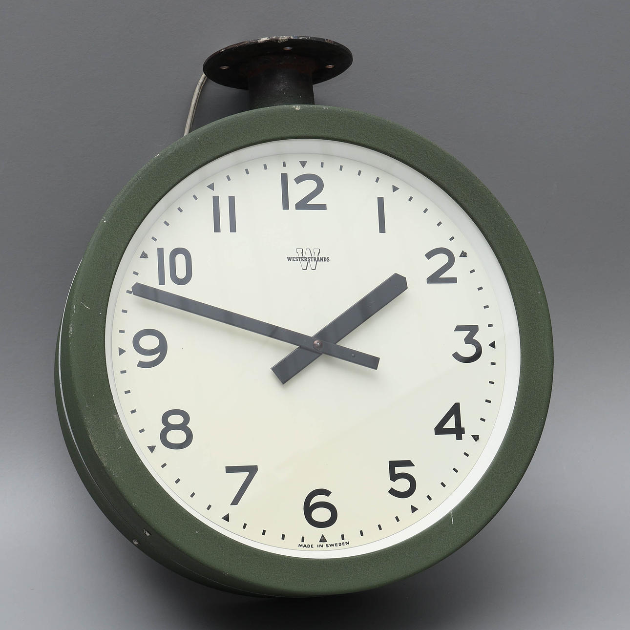 A double sided wall clock/station clock, Westerstrands, 20th century.