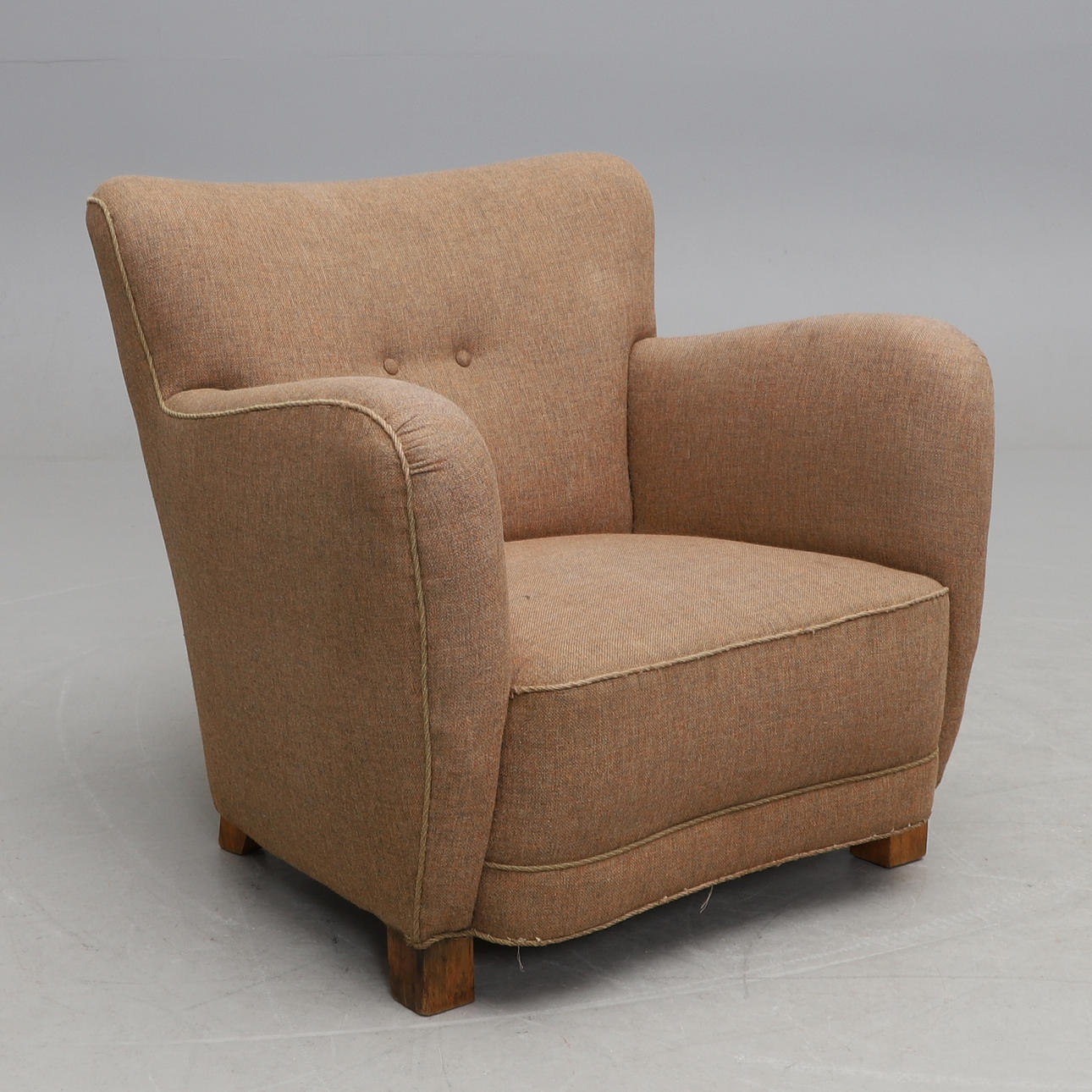 An armchair by Robert Rasmussen, Valby, with a badge.
