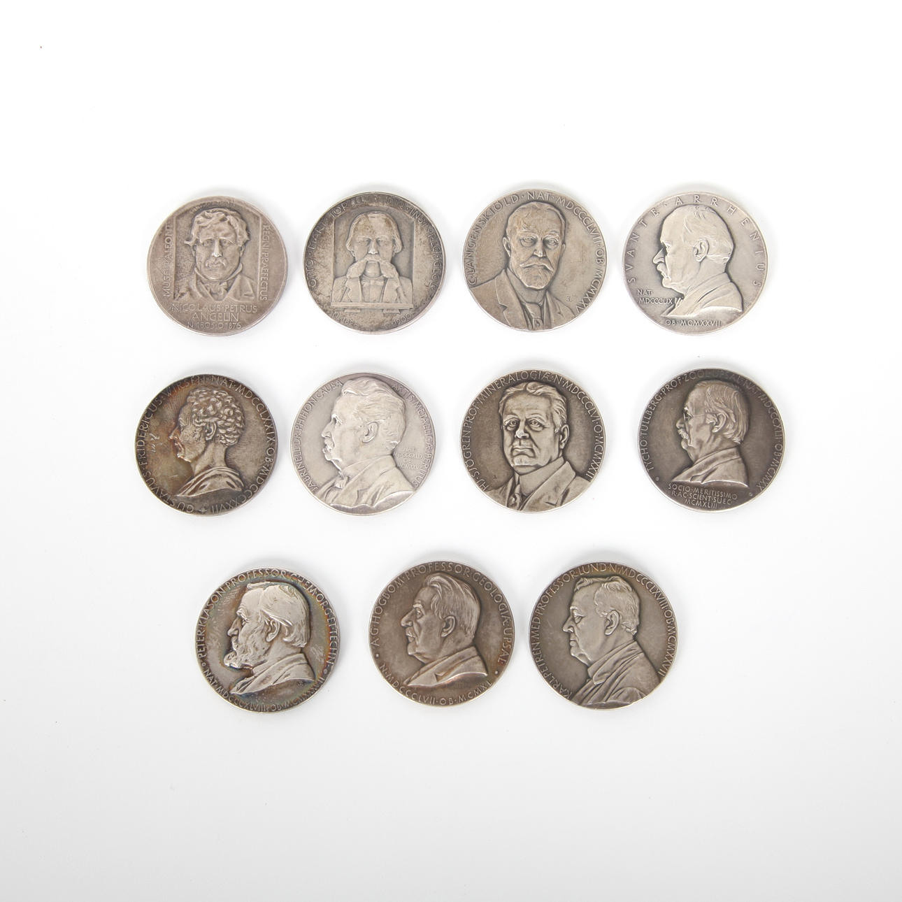11 silver commemorative medals, 1932-1955.