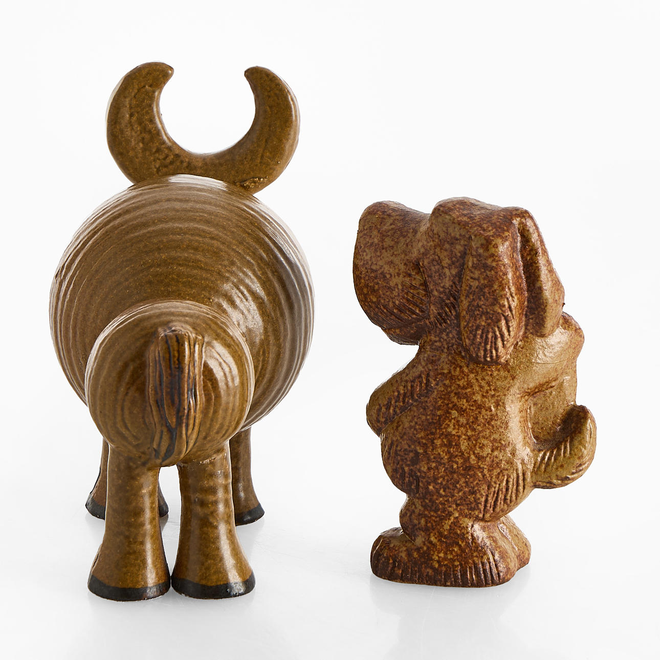 LISA LARSON (1931-2024). Two figurines, “Buffalo”, from the series