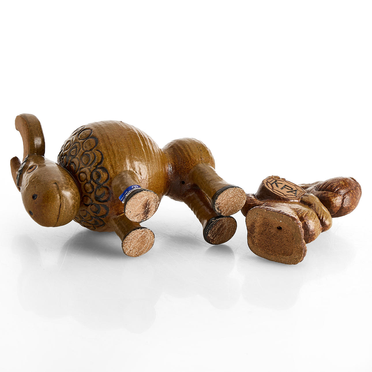 LISA LARSON (1931-2024). Two figurines, “Buffalo”, from the series