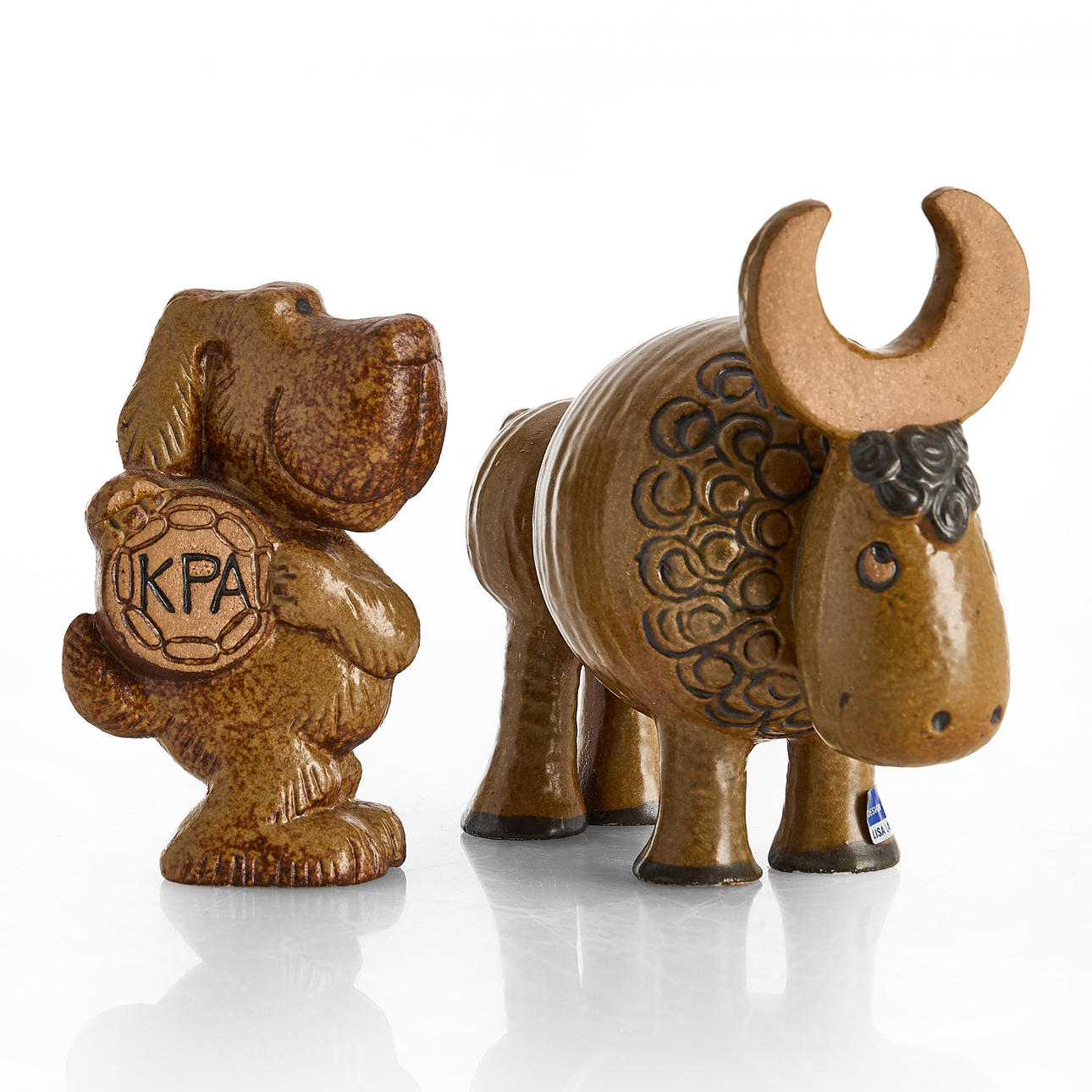LISA LARSON (1931-2024). Two figurines, “Buffalo”, from the series