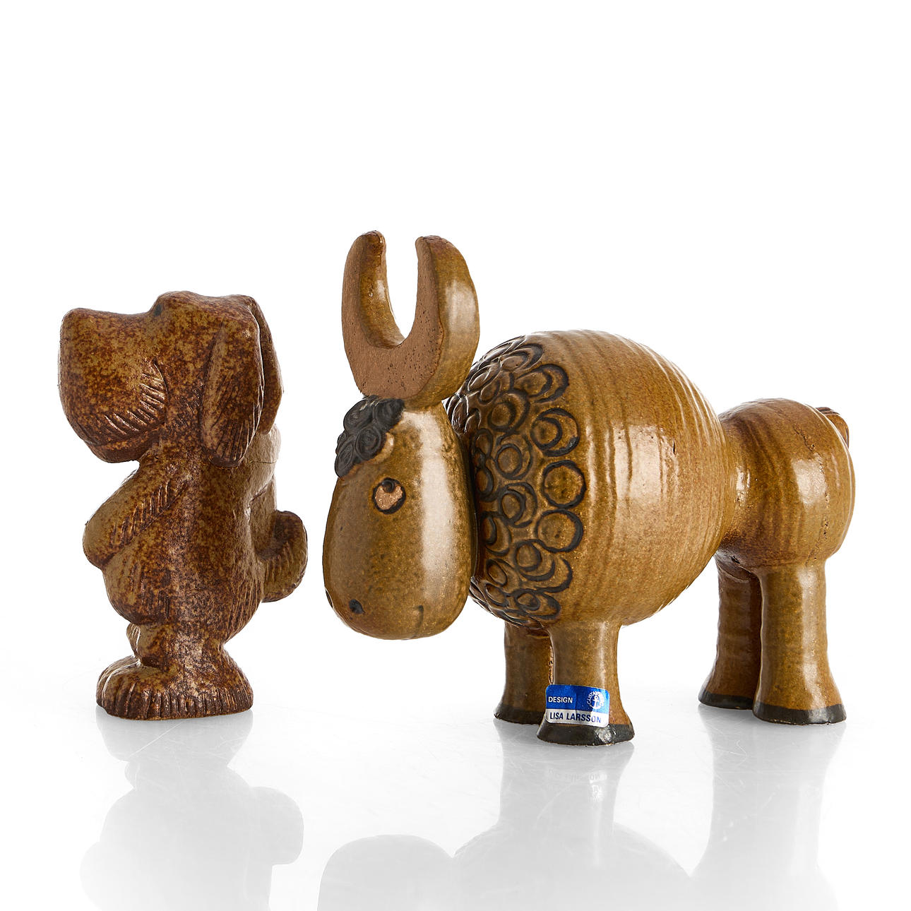 LISA LARSON (1931-2024). Two figurines, “Buffalo”, from the series