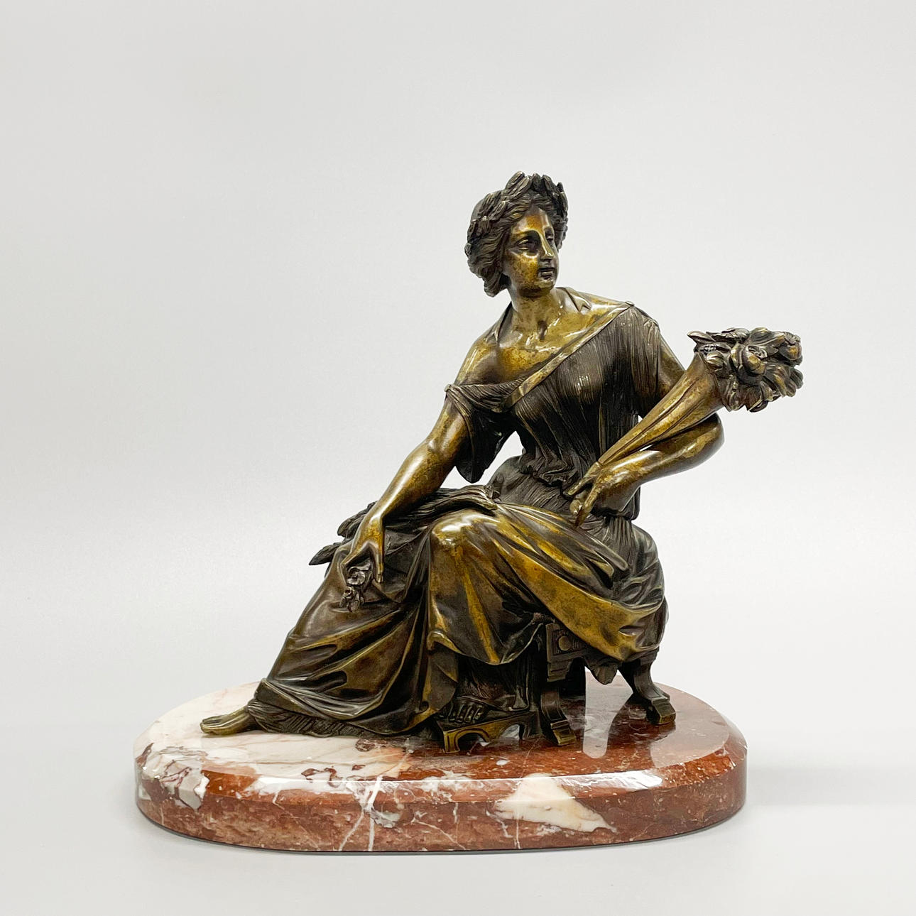19THC BRONZE FIGURE ON A PINK MARBLE BASE.