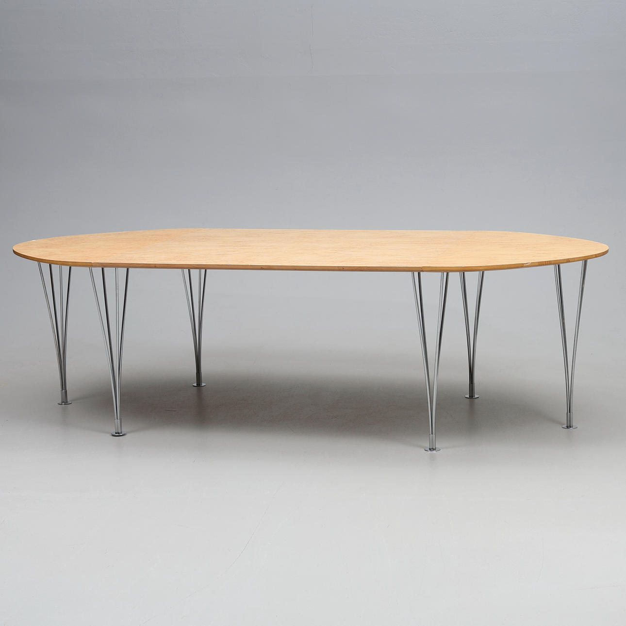 BRUNO MATHSSON. A 'superelips' table, Masur birch, 6 legs, Bruno Mathsson/Piet Hein, second half of the 20th century.