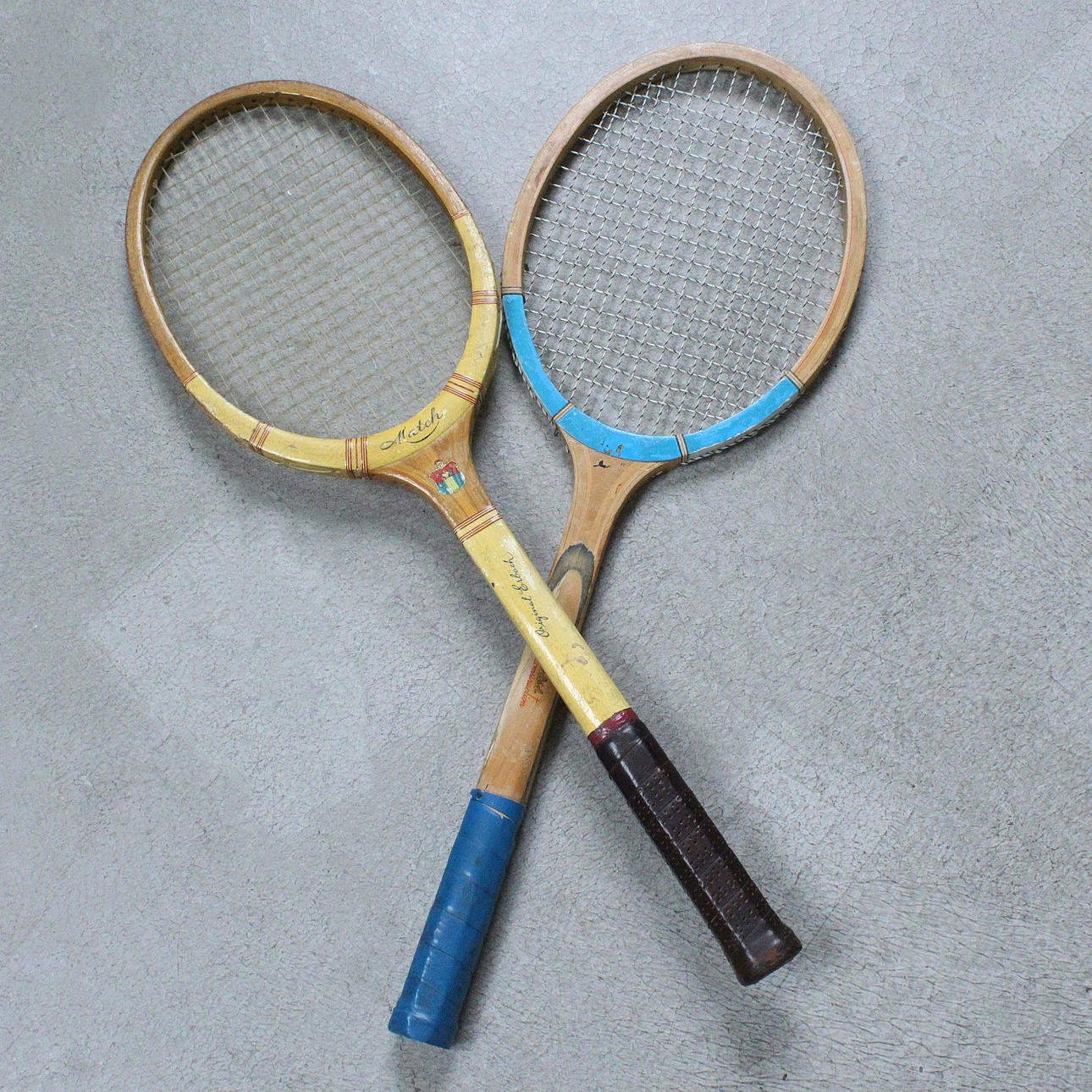 Two vintage tennis rackets.