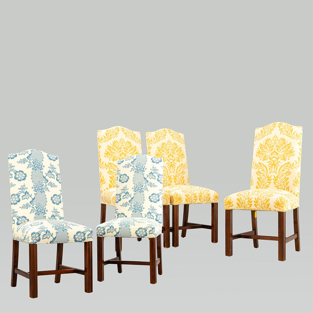 Five dining chairs with textile upholstery by Pierre Frey.