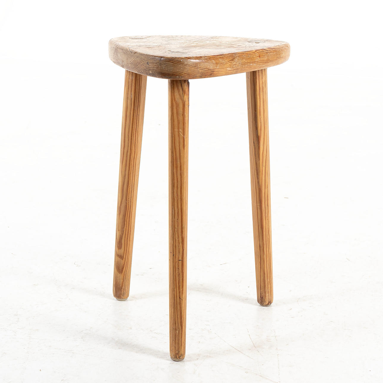 A pine stool, second half of the 20th century.