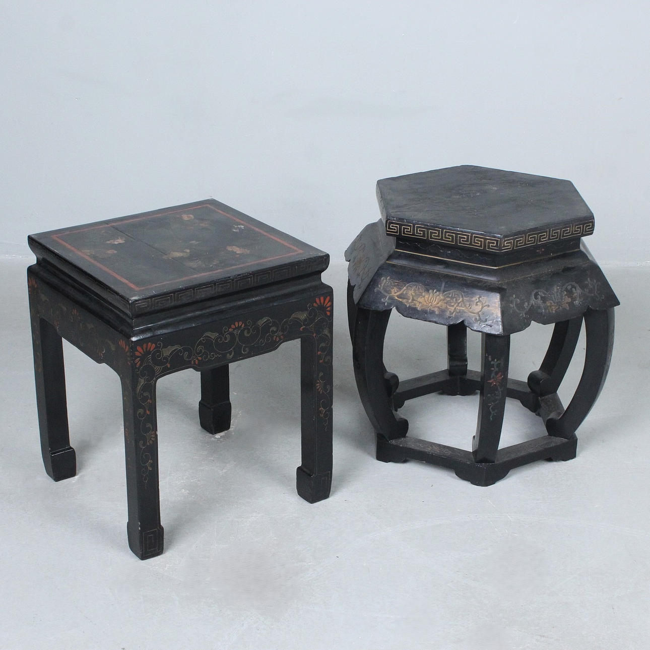 Chinese lacquer tables with ornaments.