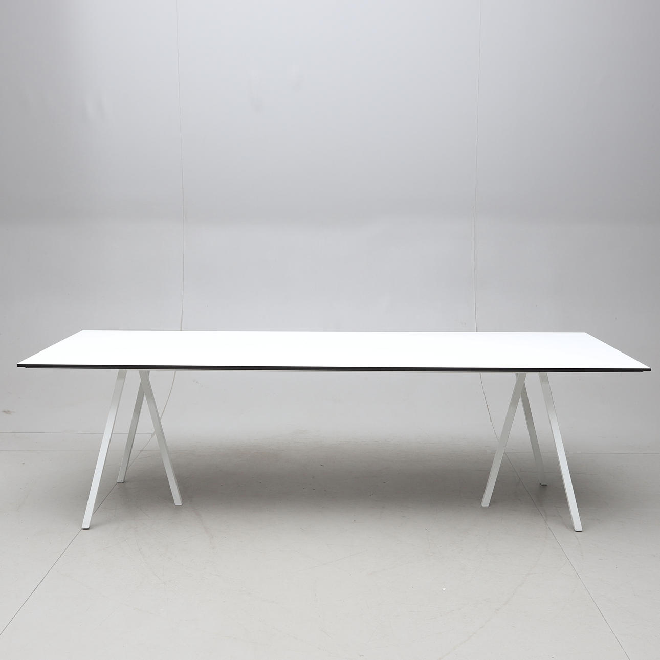 LEIF JØRGENSEN. table, white lacquered metal legs/laminated board “Loop”, for Hay, Denmark.