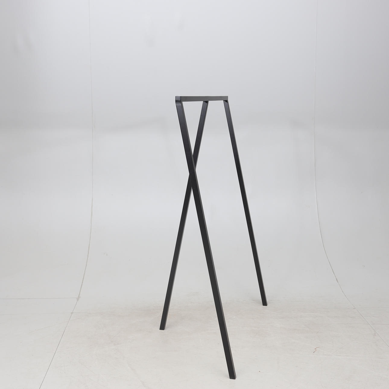 A coat hanger, lacquered metal, “Loop Stand”, for Hay.