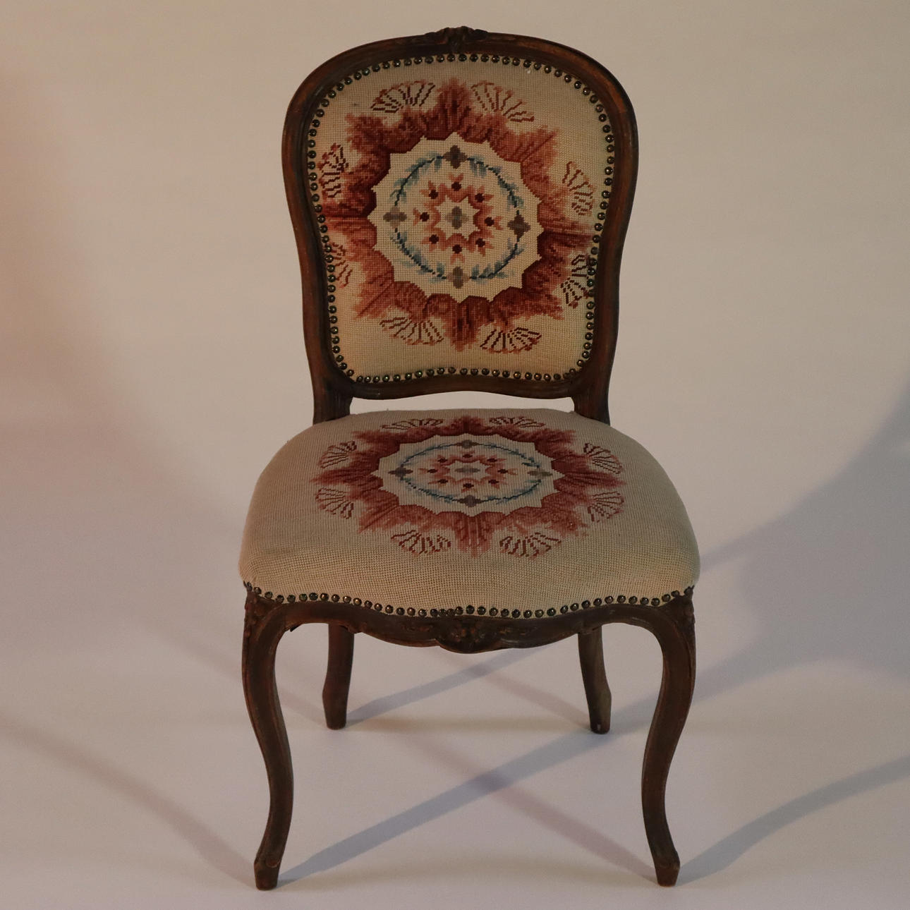 tapestry chair, wooden frame.