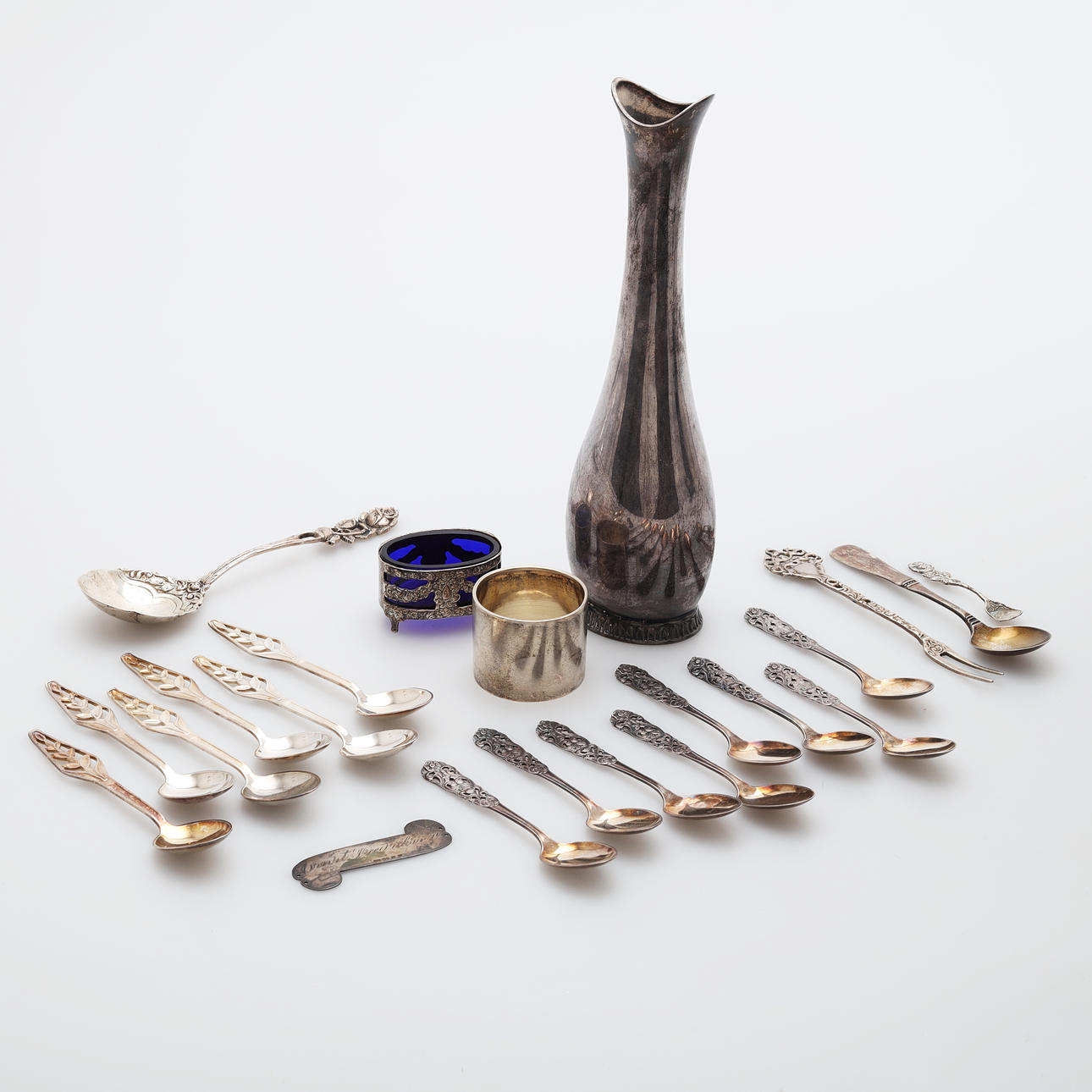 OBJETOS DE PLATA, 22 piezas, peso 369 gramos.