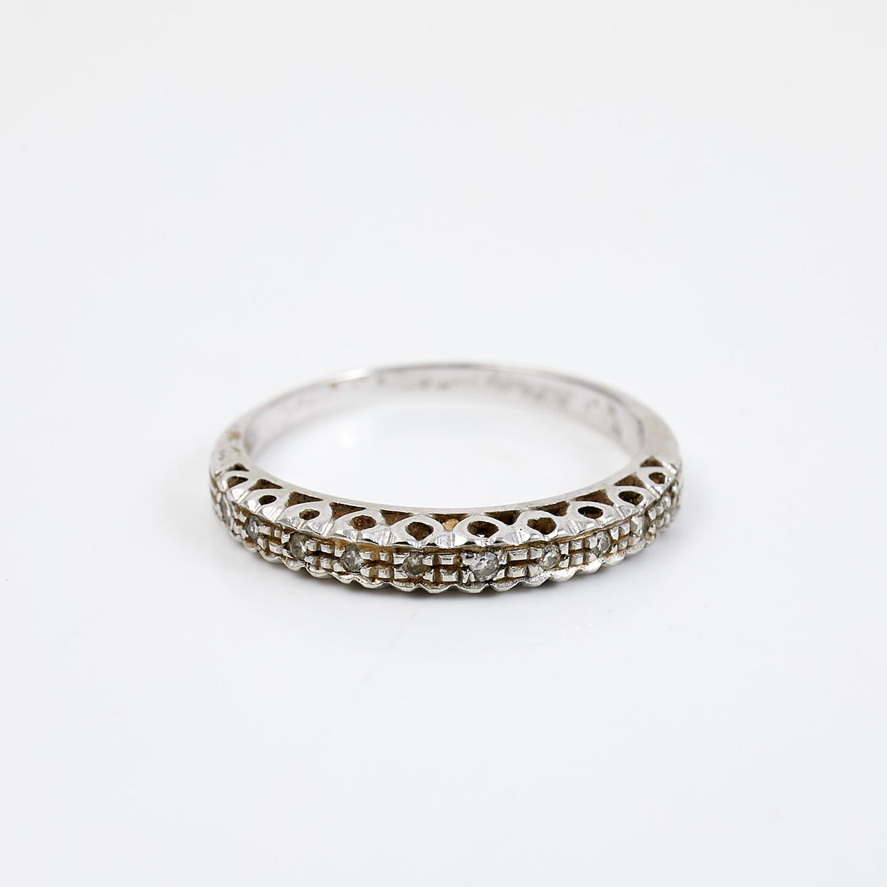 RING, so called semi-alliance 18k white gold, smaller diamonds.