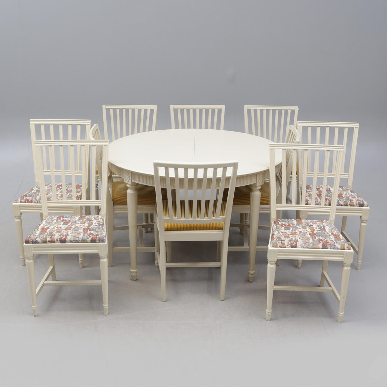 DINING ROOM GROUP, table with 3 inserts, 10 Gustavian style chairs, 20th century.