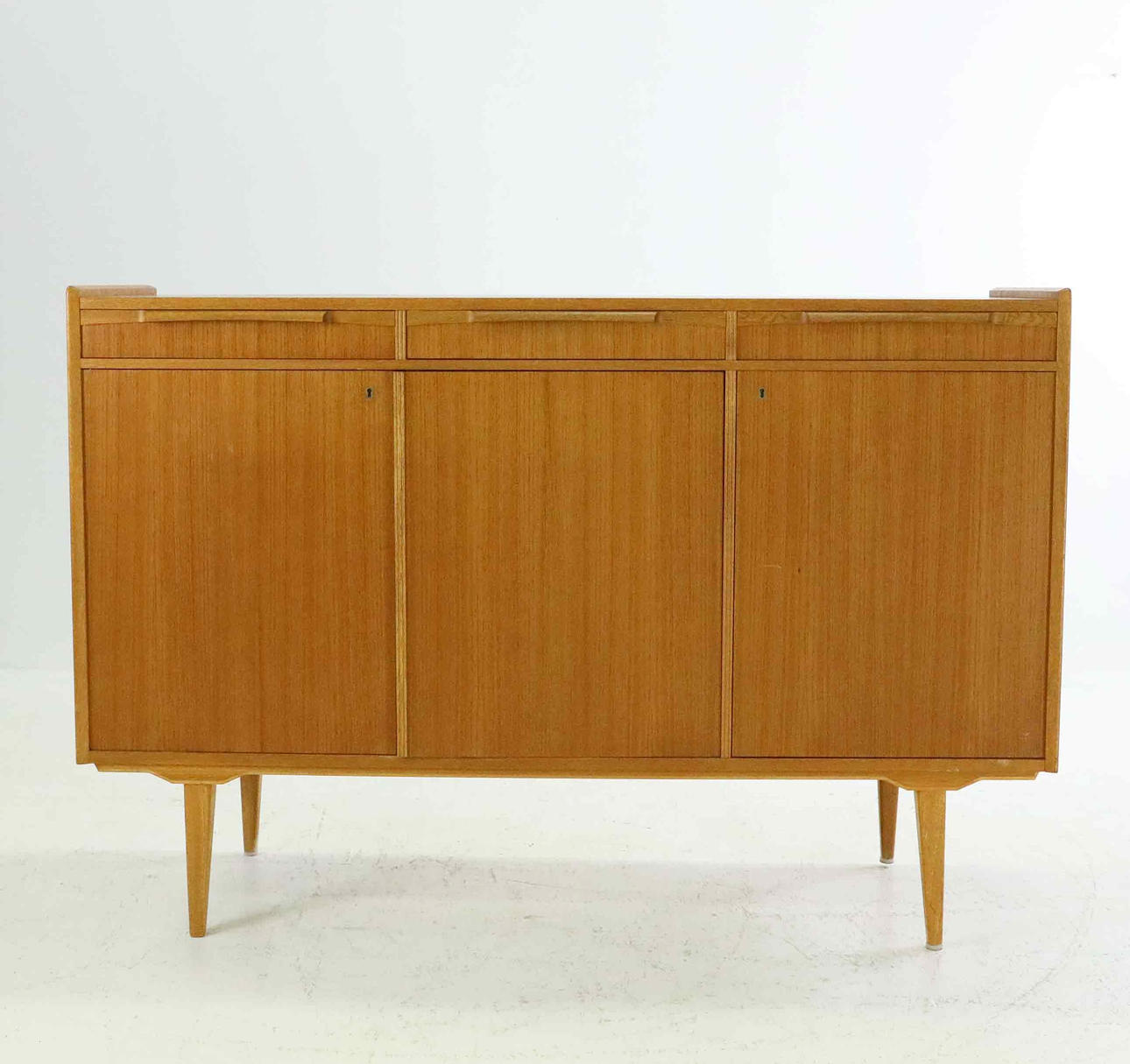 A 1960's teak sideboard.
